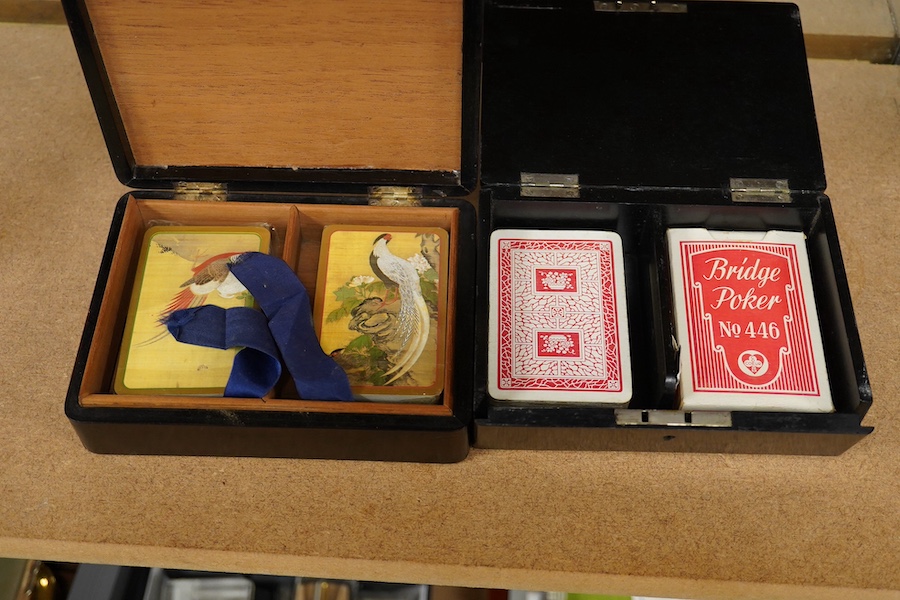 Two Edwardian/George V silver mounted ebonised playing card boxes, largest 16cm wide. Condition - fair/good